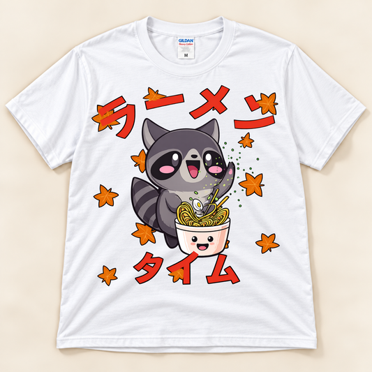 White Gildan 5000 kawaii raccoon ramen shirt featuring a cute raccoon with a noodle bowl, fall leaves and Japanese Ramen Time artwork.