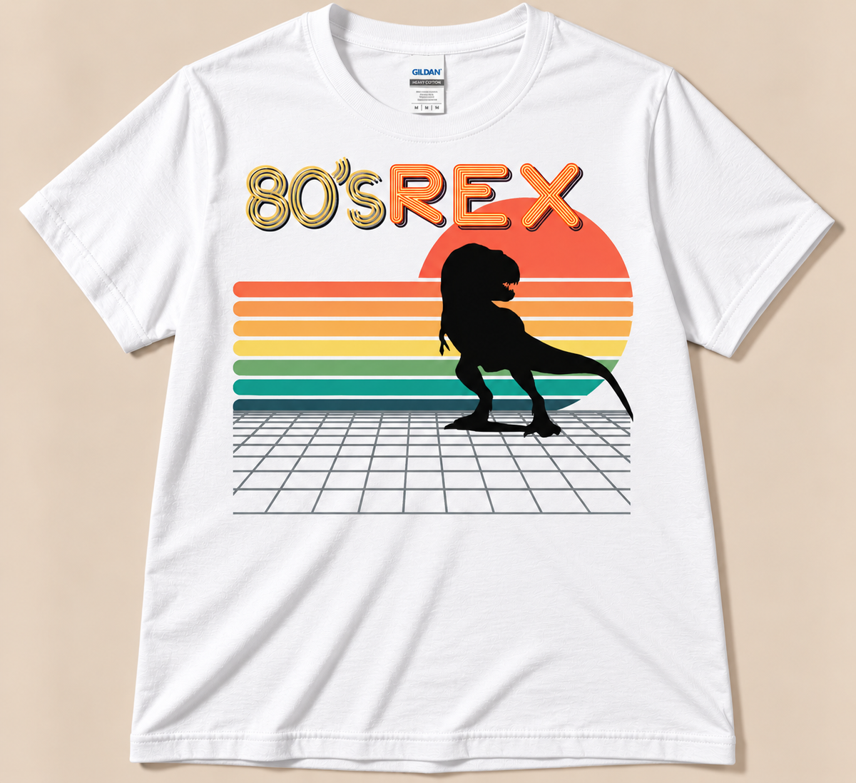 White Gildan 5000 80’s REX Tee featuring black T-Rex, colorful retro sunset and 80s grid dinosaur design
