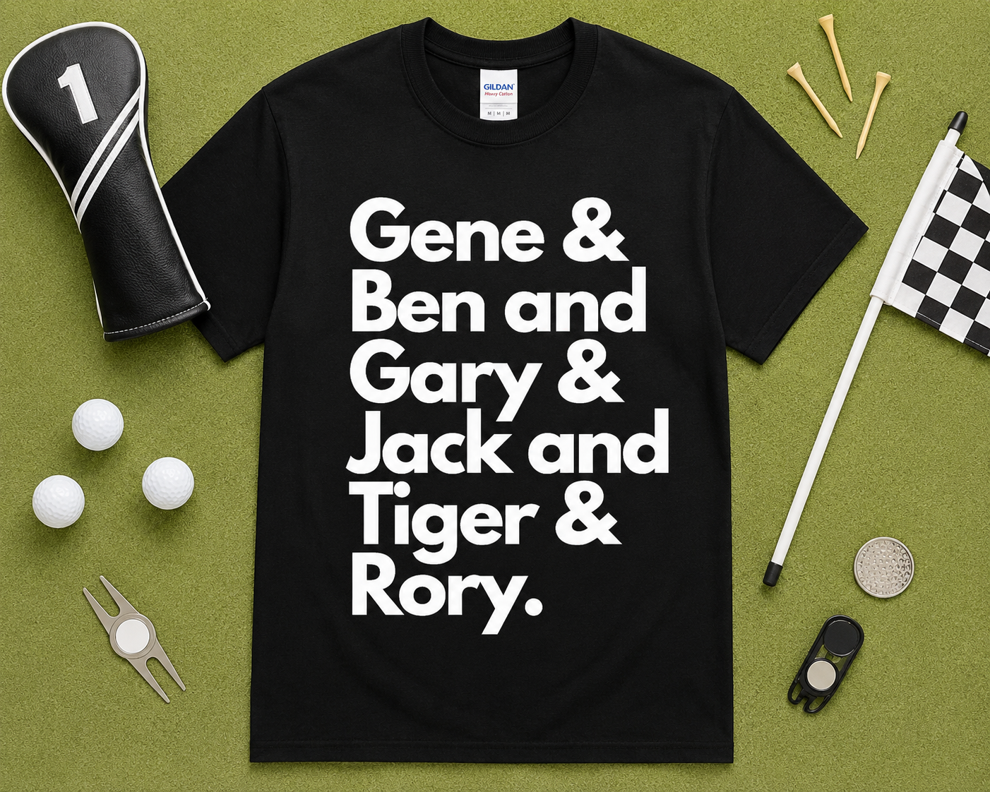 Black Gildan 5000 funny golf t shirt flatlay featuring Gene Ben Gary Jack Tiger Rory graphic with golf themed accessories on light green grass, golfer gift, unisex golf apparel, USA golf lifestyle fashion.
