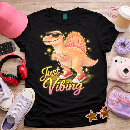 Just Vibing spinosaurus graphic tee on black shirt with sunglasses sneakers and glowing stars aesthetic dinosaur design