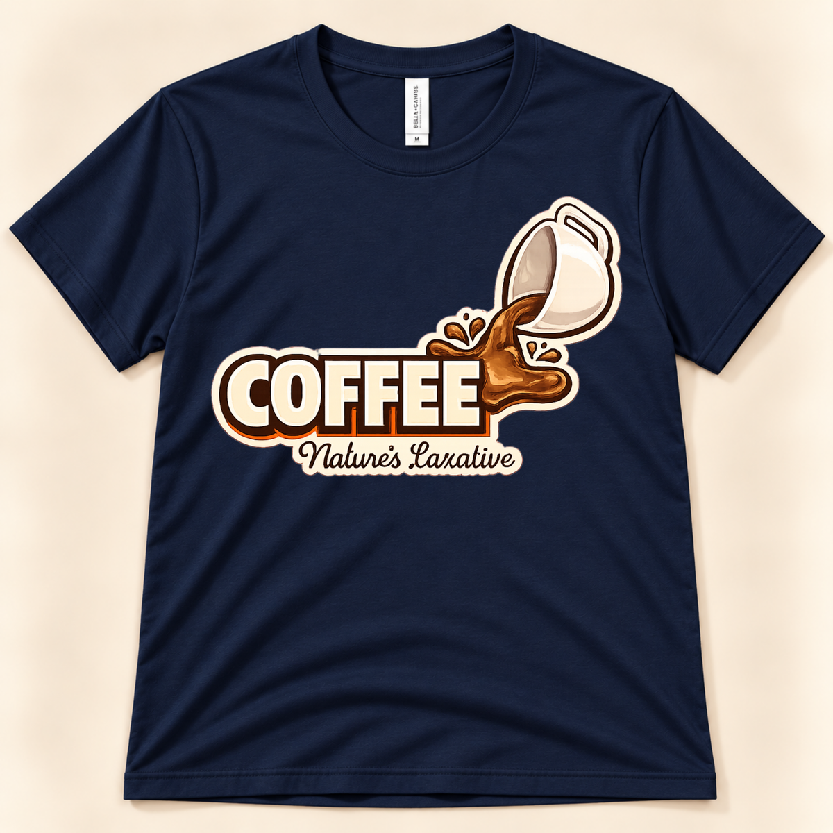 Navy Bella Canvas 3001 Coffee Nature’s Laxative tee featuring a humorous coffee cup pouring graphic for coffee drinkers and caffeine lovers from New Chapter Tees, a California small business.