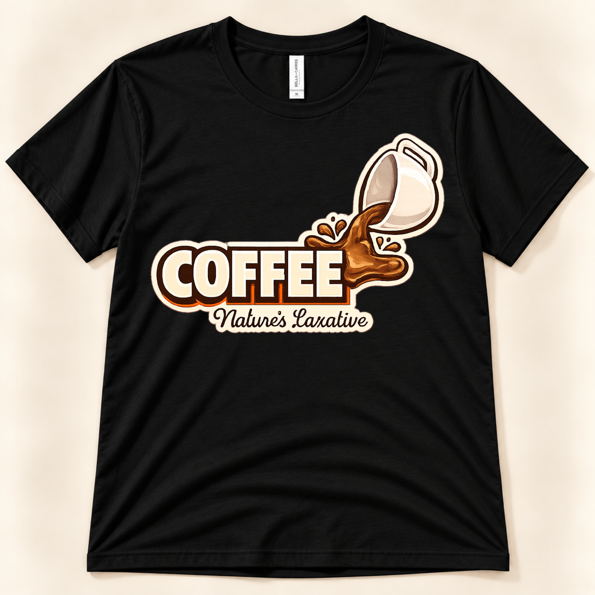 Black Bella Canvas 3001 Coffee Nature’s Laxative shirt featuring a humorous pouring coffee cup graphic for caffeine and coffee lovers from New Chapter Tees, a California small business.