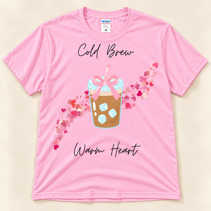 Light Pink Gildan 5000 cute coffee tee with a cold brew drink, pink bow and playful trail of colorful hearts.