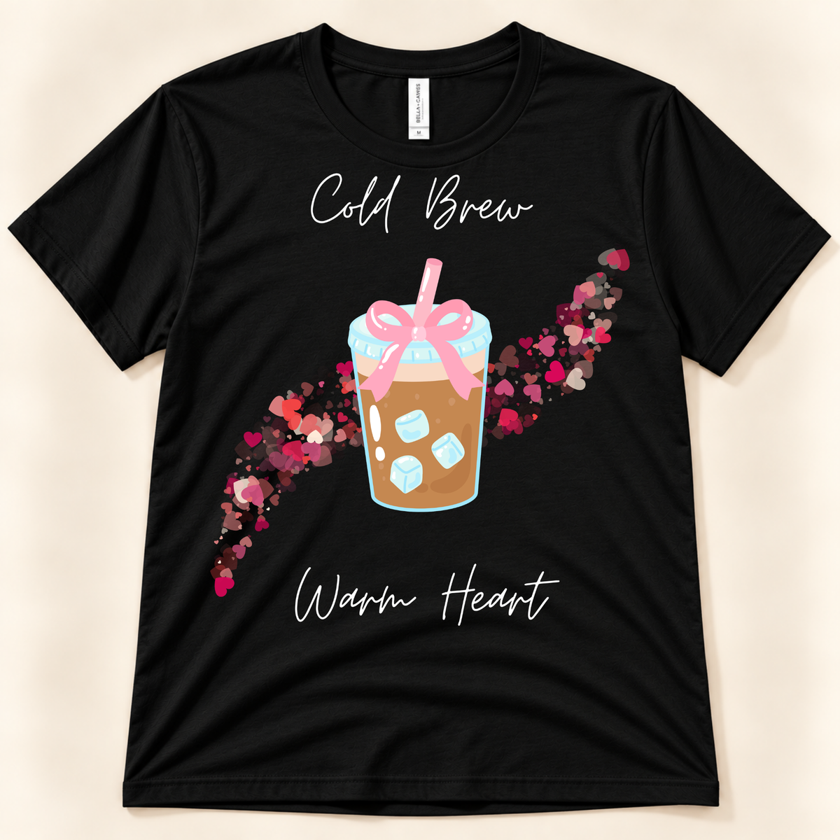 Black Bella Canvas 3001 iced coffee shirt featuring a cute cold brew with pink bow and colorful heart design.