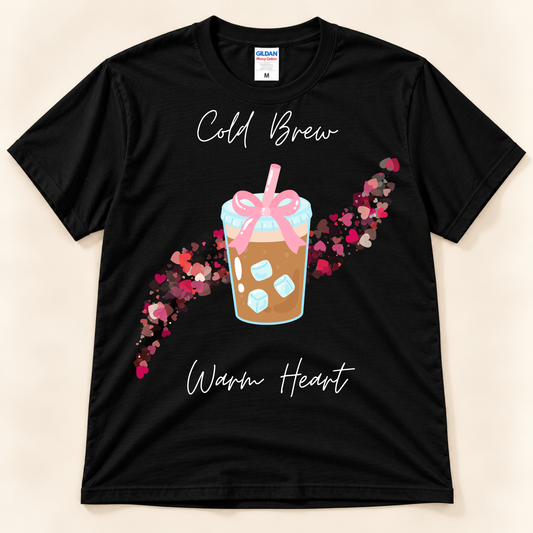 Black Gildan 5000 coffee graphic tee featuring a cute cold brew with pink bow and colorful heart trail.