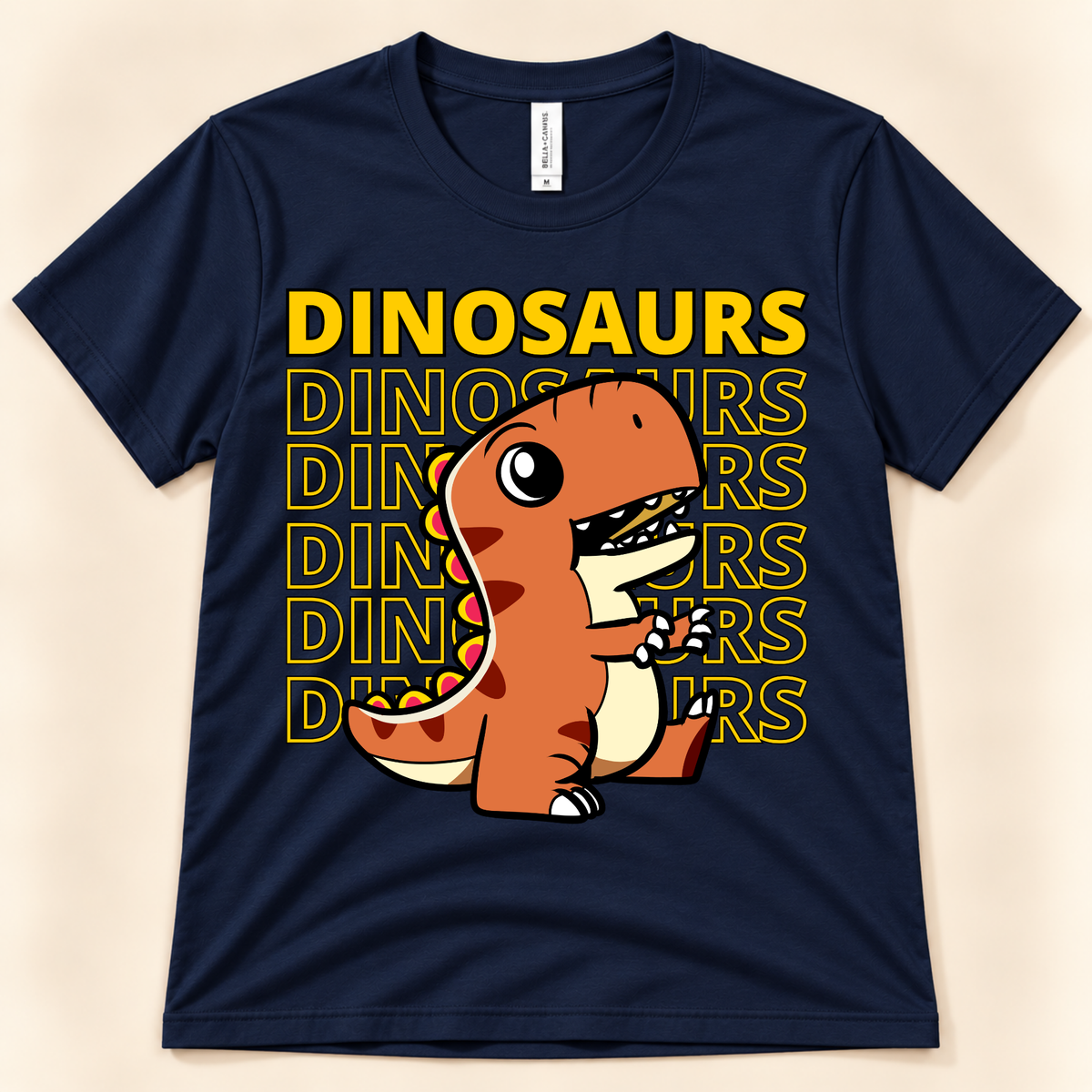 Navy Bella Canvas 3001 T Rex graphic tee with a cute orange dinosaur and repeated Dinosaurs lettering for adult and youth dinosaur fans.