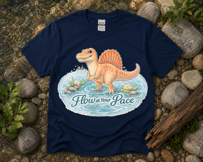 Flow at Your Pace Spinosaurus dinosaur graphic shirt on navy Gildan 5000 unisex tee with peaceful river design funny soft life dinosaur apparel gift USA