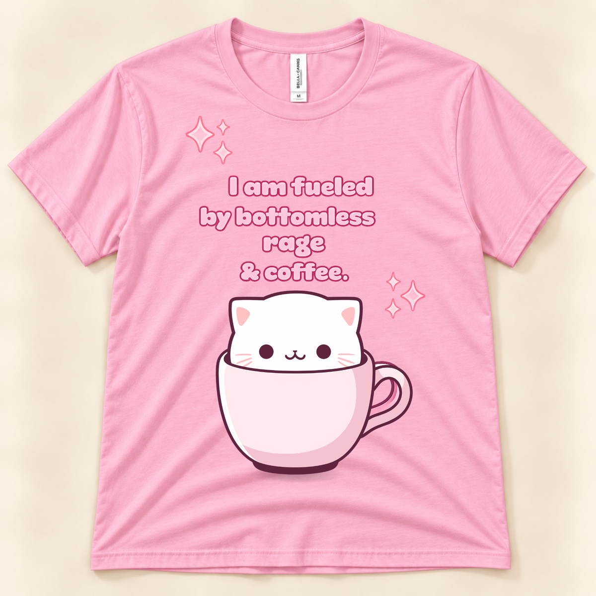 Pink Bella Canvas 3001 funny cat coffee graphic tee featuring a cute white cat in a pink cup with a sarcastic coffee saying.