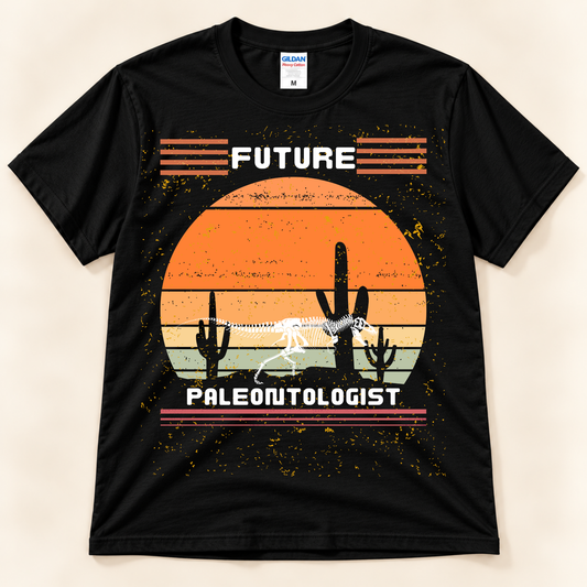 Black Gildan 5000 Future Paleontologist dinosaur shirt featuring a retro fossil skeleton, desert sunset and vintage paleontology graphic.