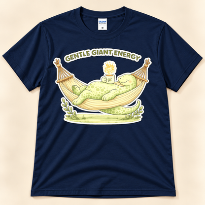 Navy Gildan 5000 Gentle Giant Energy graphic tee featuring a cute green brontosaurus relaxing in a hammock with a cozy warm drink.