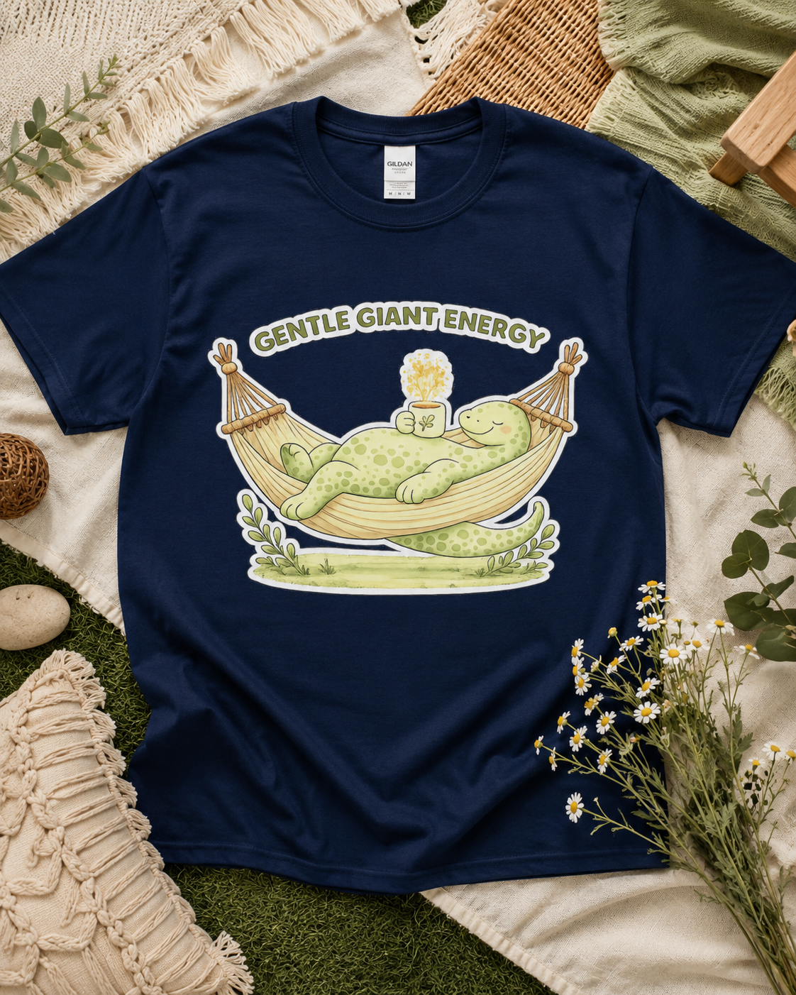 Gentle Giant Energy dinosaur shirt on Navy Gildan Heavy Cotton with relaxing hammock dinosaur graphic for cozy outdoor lifestyle apparel in the USA.