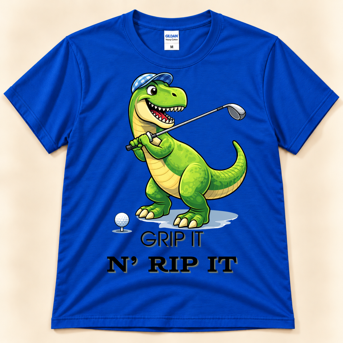 Royal Blue Gildan 5000 T-Rex golf shirt featuring a funny golfing dinosaur, golf ball and Grip It N Rip It design.