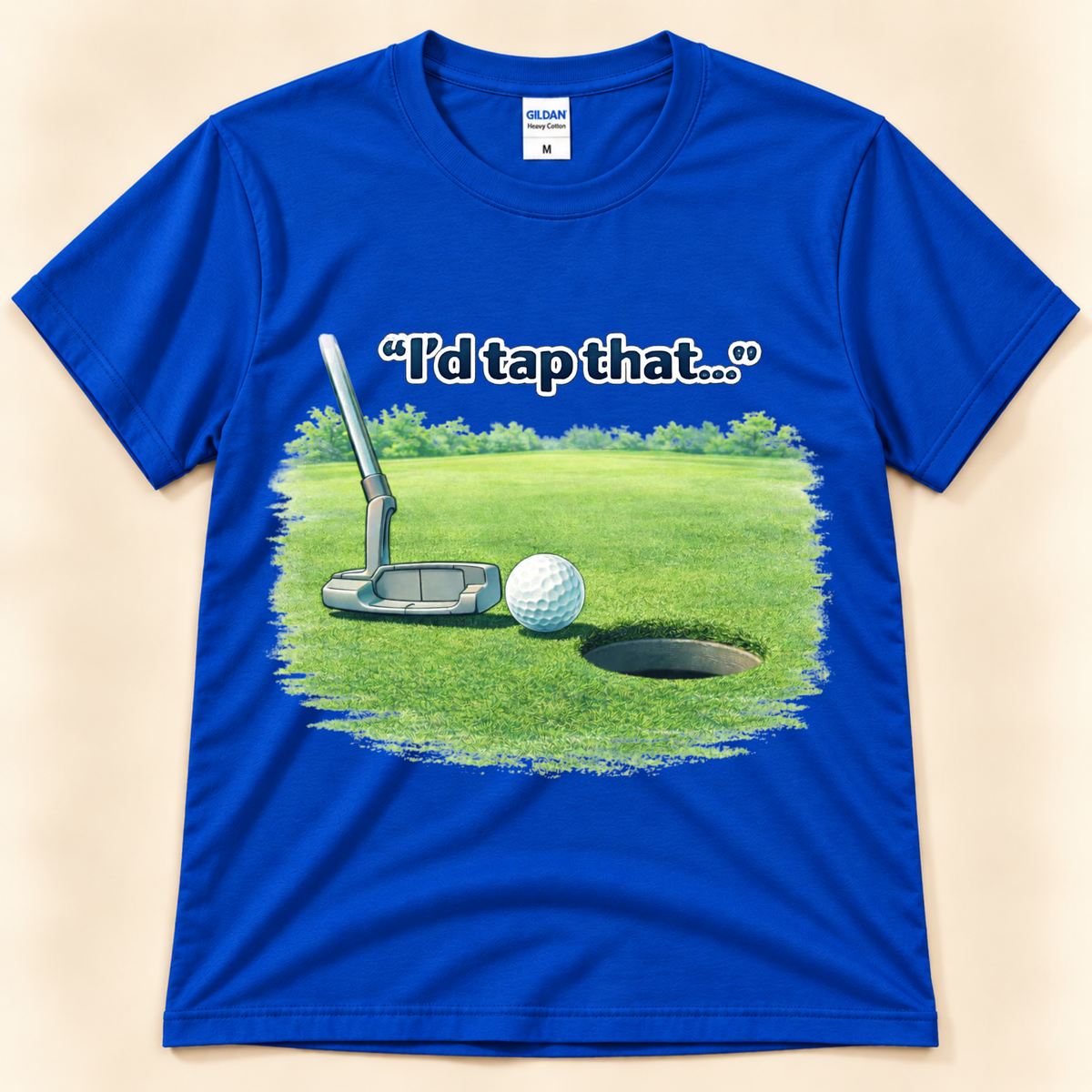 Royal Blue Gildan 5000 funny I’d Tap That golf shirt featuring a putter, golf ball and putting hole for golfers from New Chapter Tees, a California small business.