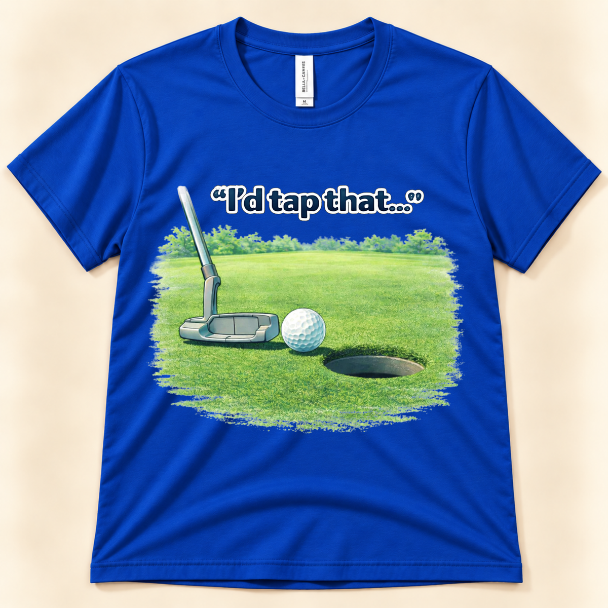 True Royal Bella Canvas 3001 funny I’d Tap That golf shirt featuring a putter, golf ball and putting green from New Chapter Tees, a California small business.