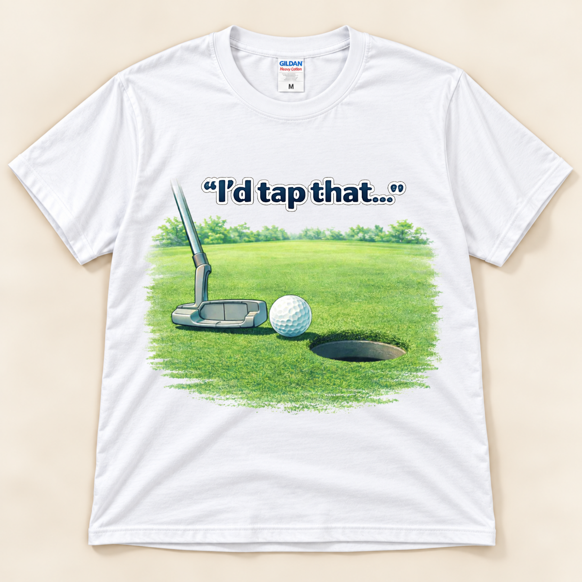 White Gildan 5000 I’d Tap That funny golf tee featuring a putter and golf ball near the hole on a putting green from New Chapter Tees, a California small business.