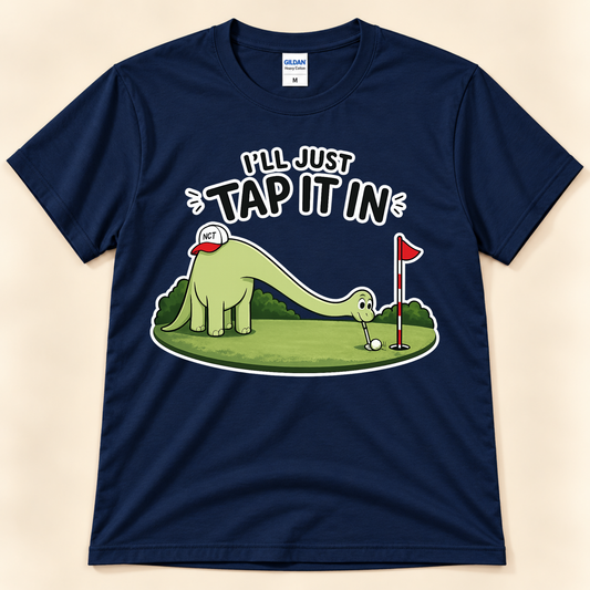 Navy Gildan 5000 I’ll Just Tap It In golf shirt featuring Brussel the Brontosaurus putting on the green for golf and dinosaur lovers from New Chapter Tees, a California small business.