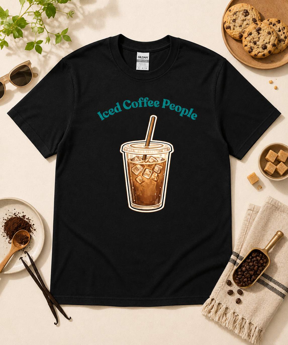 Black Iced Coffee People funny coffee graphic tee featuring iced coffee cup design and cozy coffee flat lay props