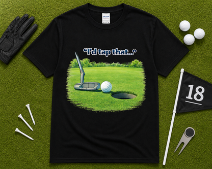 Black golf graphic tee flatlay featuring I'd Tap That putting design on Gildan shirt with golf accessories, funny golfer gift shirt for men and women in the USA.