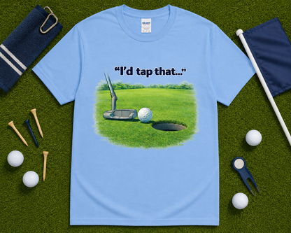 Carolina blue golf graphic tee flatlay with I'd Tap That golf putting artwork and golf accessories, humorous golfer shirt and golf lover gift in the USA.