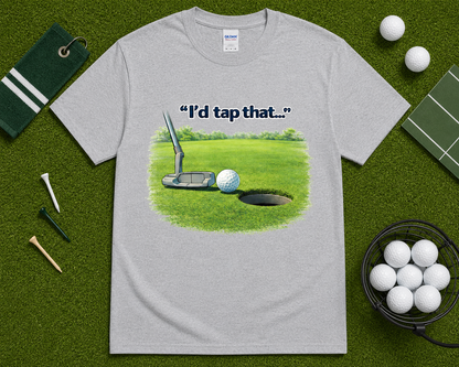 Sport gray golf t shirt flatlay featuring I'd Tap That putting graphic with golf themed accessories, funny golf apparel gift for men and women golfers.