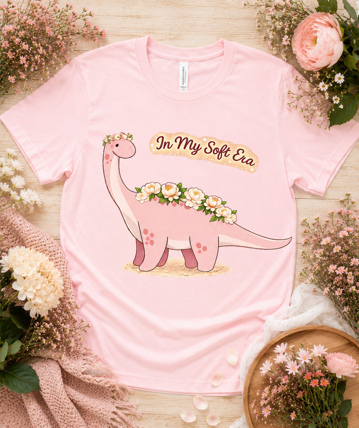 Bella Canvas 3001 light pink premium dinosaur shirt featuring In My Soft Era floral dinosaur artwork cute soft girl aesthetic gift for women girls USA