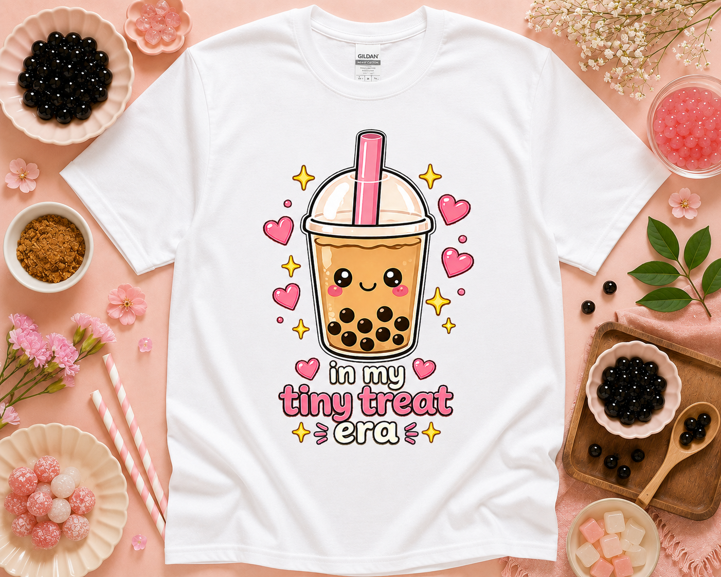 White Gildan 5000 boba shirt featuring In My Tiny Treat Era cute bubble tea design in a playful themed flatlay