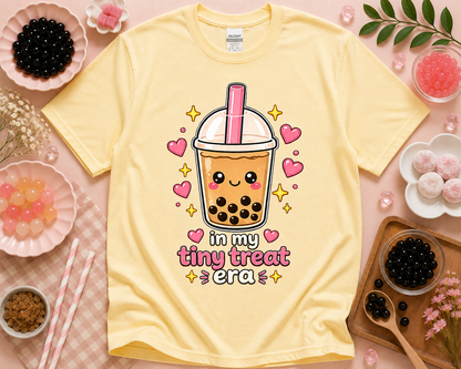 Yellow Haze Gildan 5000 In My Tiny Treat Era boba shirt with kawaii bubble tea graphic and sweet cafe flatlay