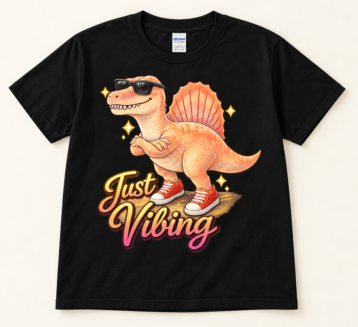 Black Gildan 5000 Just Vibing Spinosaurus Tee with orange dinosaur, sunglasses, red sneakers and retro lettering
