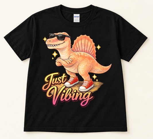 Black Gildan 5000 Just Vibing Spinosaurus Tee with orange dinosaur, sunglasses, red sneakers and retro lettering