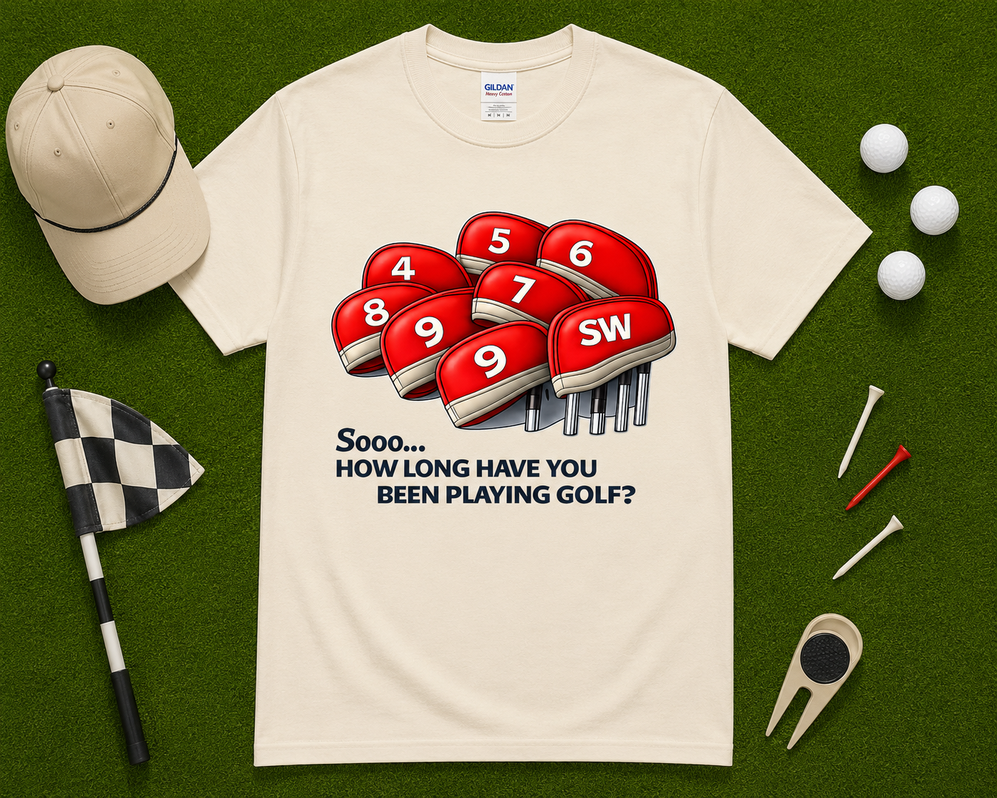 Natural golf graphic tee flatlay with funny How Long Have You Been Playing Golf artwork featuring golf club headcovers and golf accessories. Unique golf gift shirt for golfers, country club members, golf enthusiasts, and golf fans seeking humorous golf apparel in the USA.