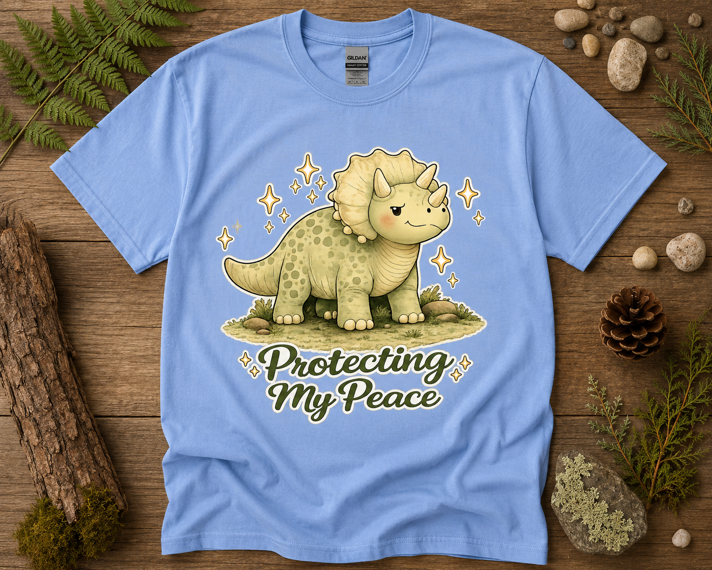 Protecting My Peace dinosaur graphic tee on Carolina Blue Gildan 5000 soft life triceratops shirt by New Chapter Tees