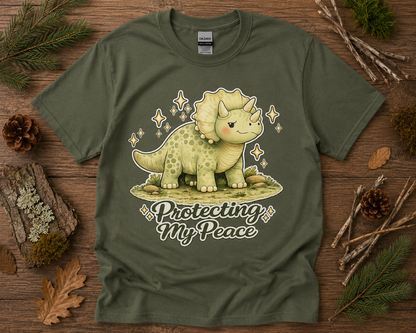 Protecting My Peace triceratops graphic tee on military green Gildan 5000 soft life dinosaur shirt for nature lovers