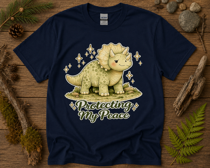 Protecting My Peace cute dinosaur graphic on navy Gildan 5000 unisex shirt with peaceful woodland aesthetic