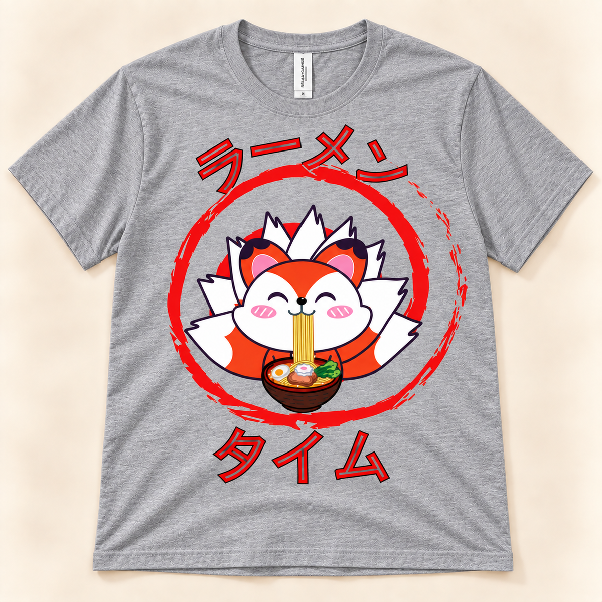 Athletic Heather soft tee with a kawaii fox eating ramen and Japanese Ramen Time design.