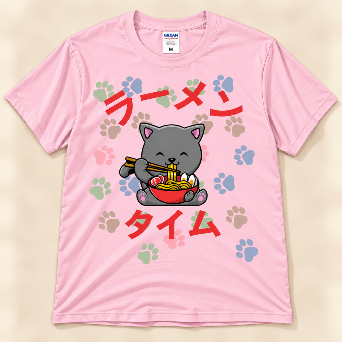 Ramen Time gray cat tee in light pink with kawaii ramen cat and colorful paw print graphic