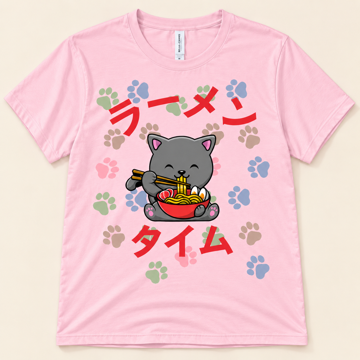 Ramen Time gray cat tee in pink with cute gray ramen cat and colorful kawaii paw prints
