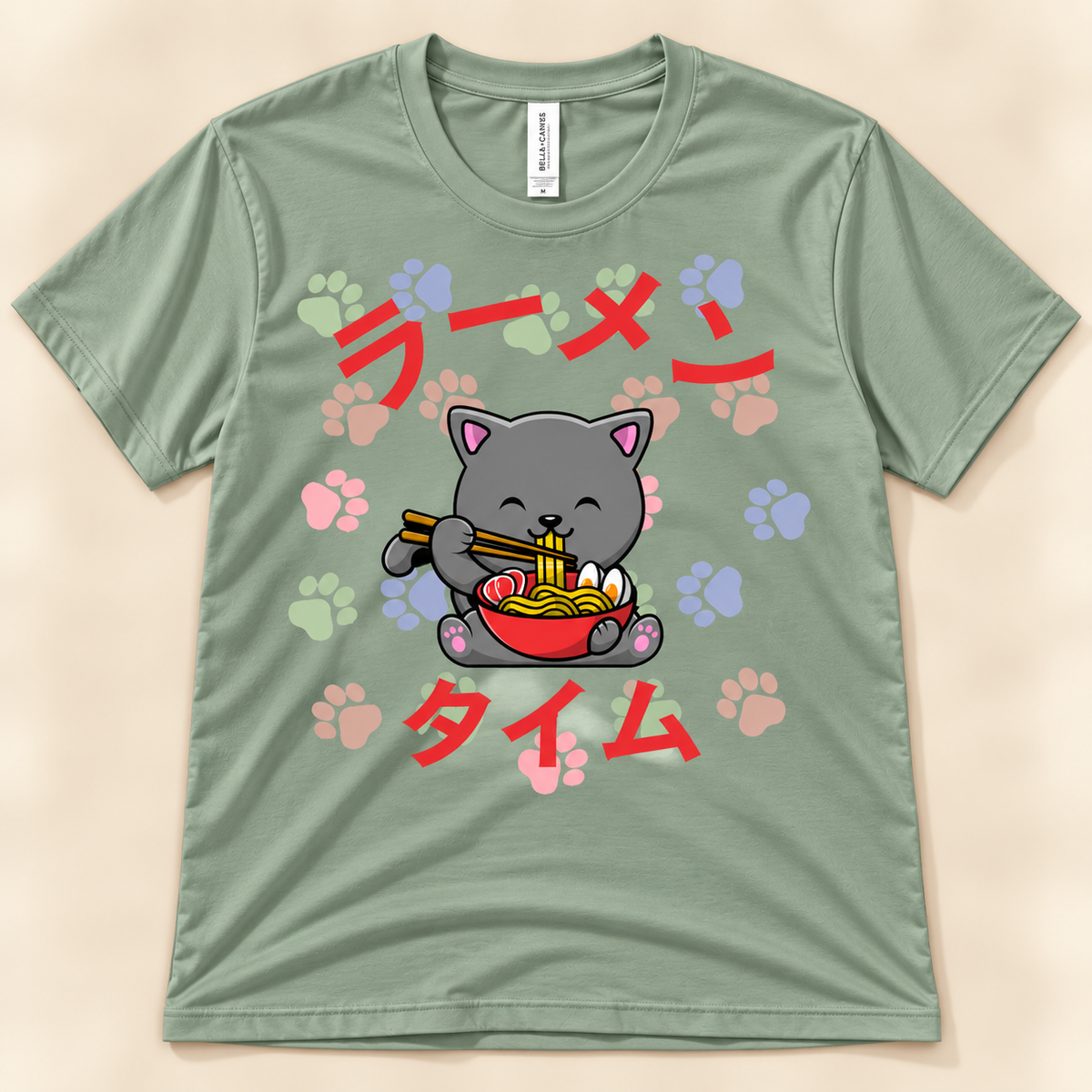 Ramen Time gray cat tee in sage with kawaii cat eating noodles and colorful paw print design