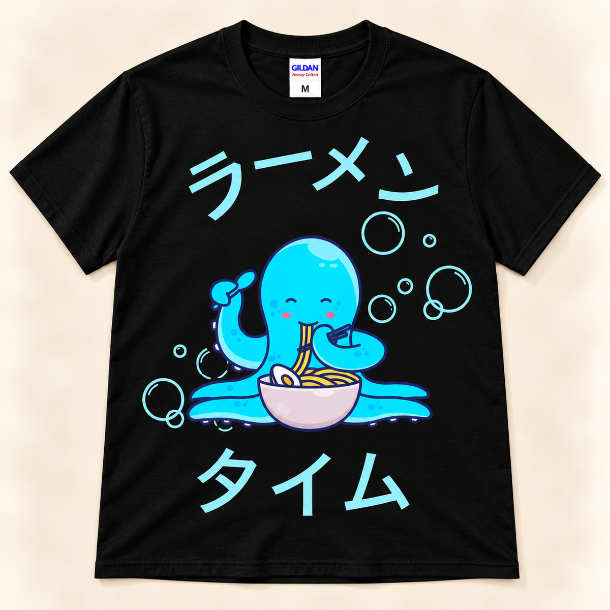 Black graphic tee with a cute blue octopus eating ramen, bubbles and Japanese Ramen Time lettering.