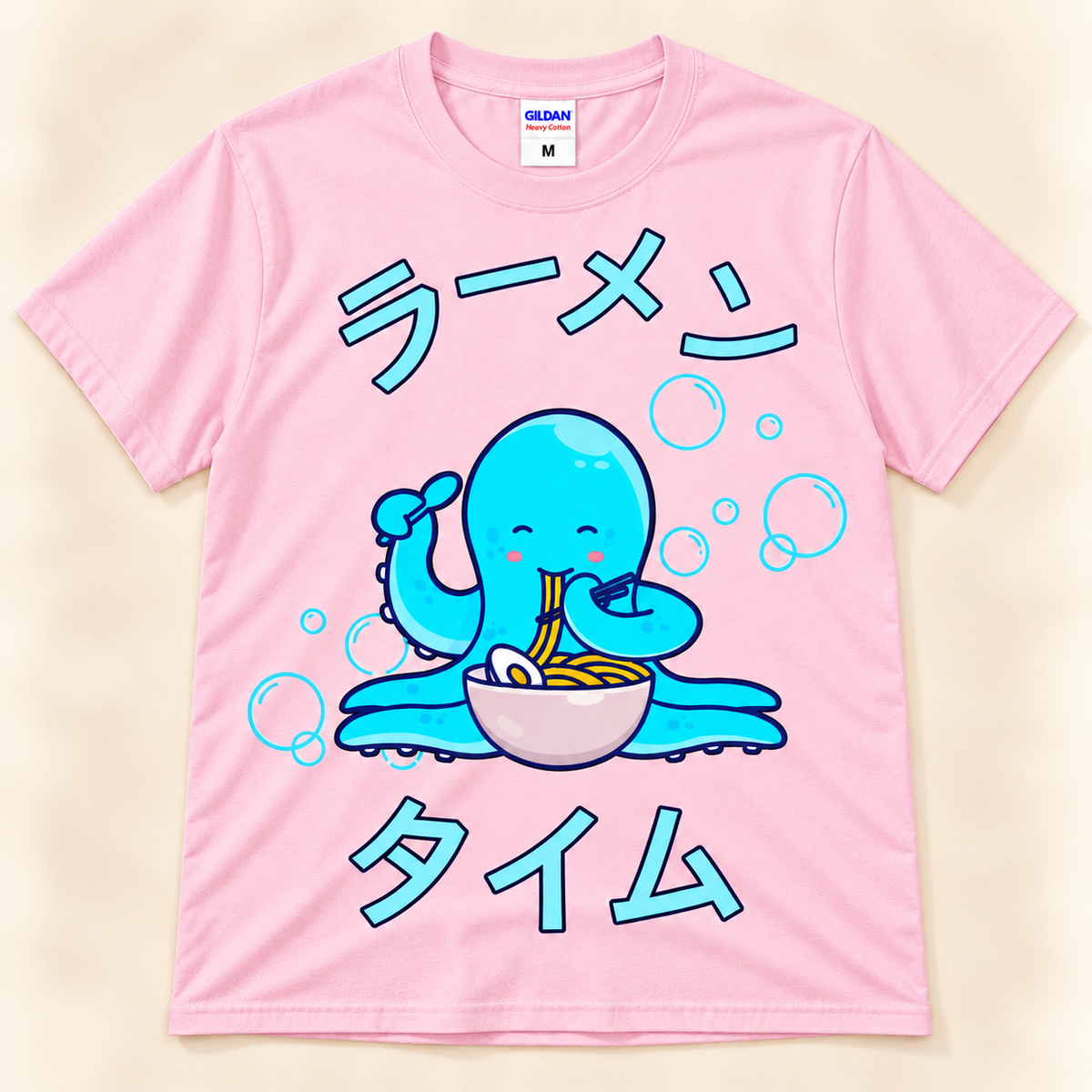 Light Pink graphic tee featuring a kawaii blue octopus eating ramen with Japanese Ramen Time lettering.