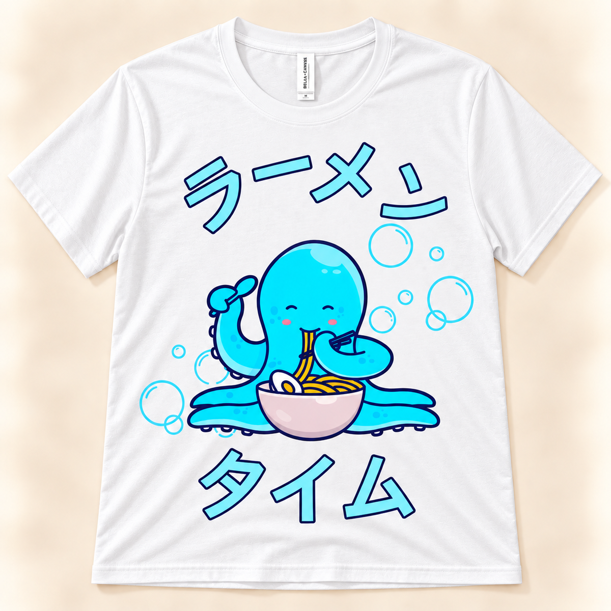 White soft graphic tee featuring a cute blue octopus eating ramen with Japanese Ramen Time lettering.
