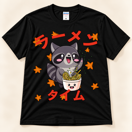 Black Gildan 5000 kawaii ramen tee featuring a cute raccoon with noodles, autumn leaves and Japanese Ramen Time artwork.