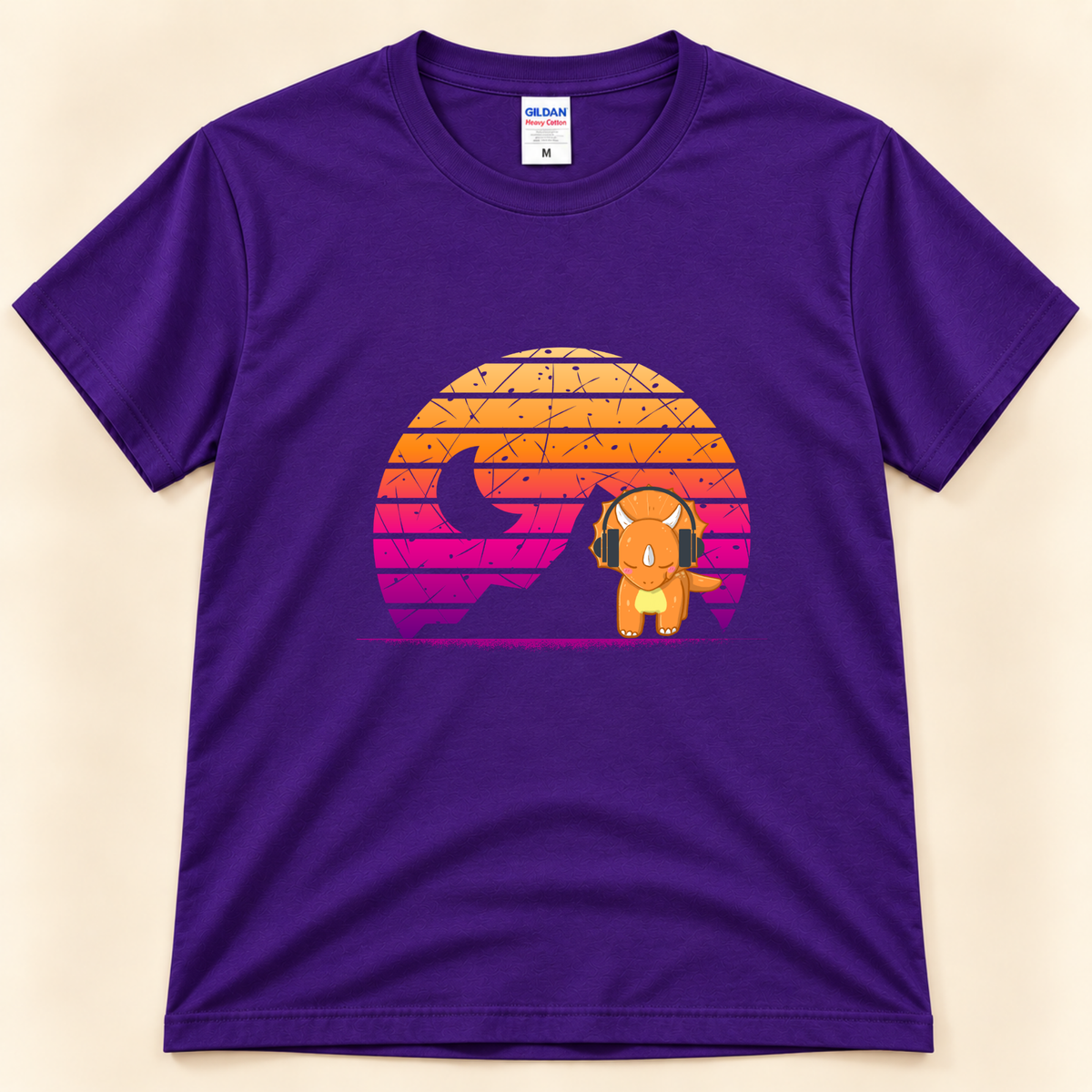 Purple Gildan 5000 dinosaur shirt featuring a cute triceratops wearing headphones with bright retro sunset artwork from New Chapter Tees, a California small business.