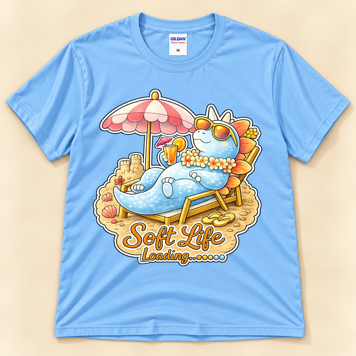 Carolina Blue Gildan 5000 Soft Life Loading graphic tee featuring a cute Stegosaurus lounging on a beach chair with sunglasses from New Chapter Tees, a California small business.