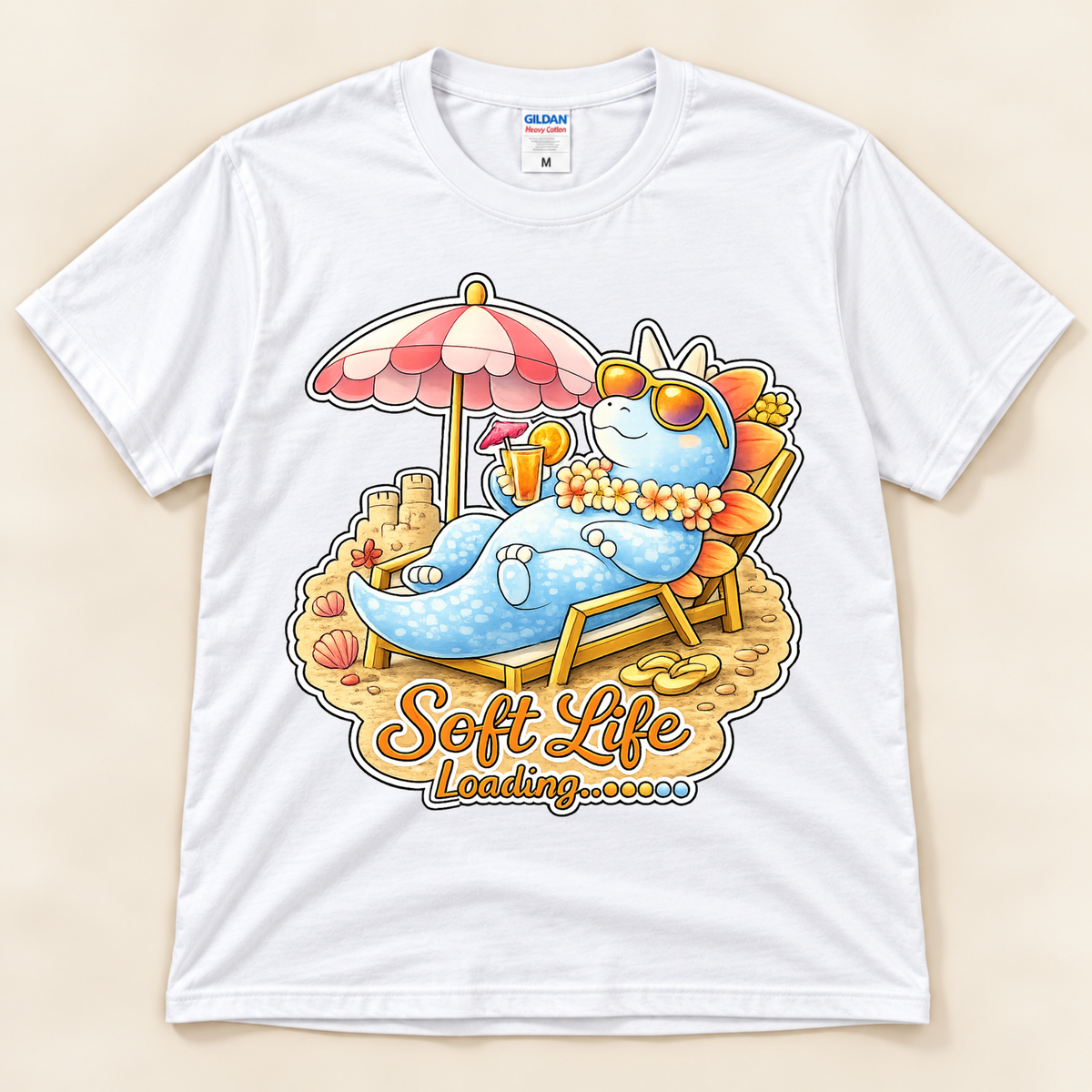 White Gildan 5000 Soft Life Loading dinosaur graphic tee featuring a cute Stegosaurus lounging under a beach umbrella from New Chapter Tees, a California small business.