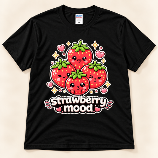 Black Gildan 5000 Strawberry Mood shirt featuring four cute red strawberries with smiling faces, green leaves, pink hearts, and playful lettering from New Chapter Tees, a California small business.