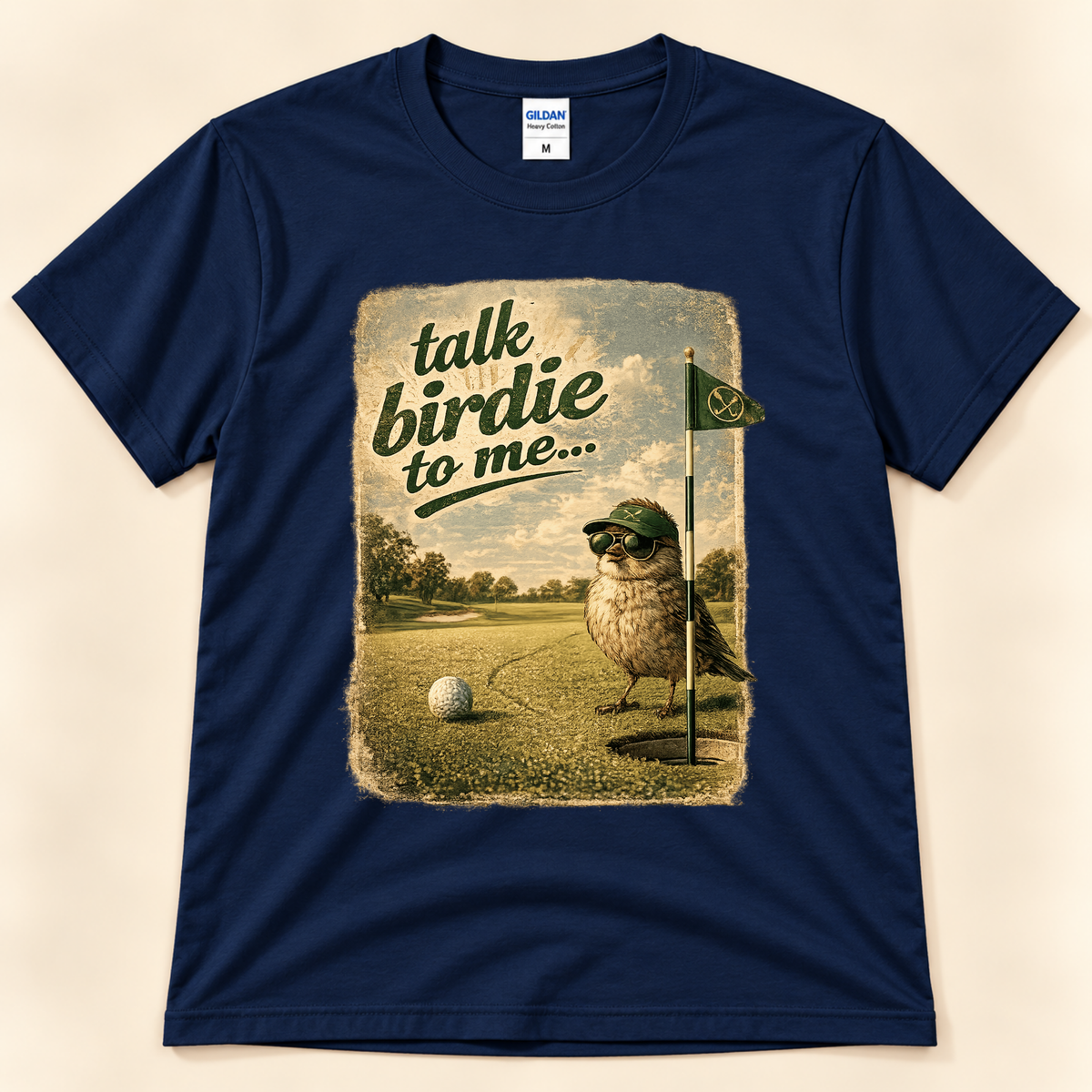 Navy Gildan 5000 Talk Birdie To Me tee featuring a funny vintage bird golfer with sunglasses on a putting green from New Chapter Tees, a California small business.