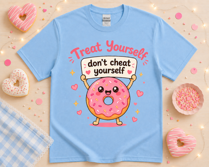 Cute donut graphic t shirt on Carolina blue Gildan tee with kawaii dessert character and bakery boutique flat lay props for women girls and teens