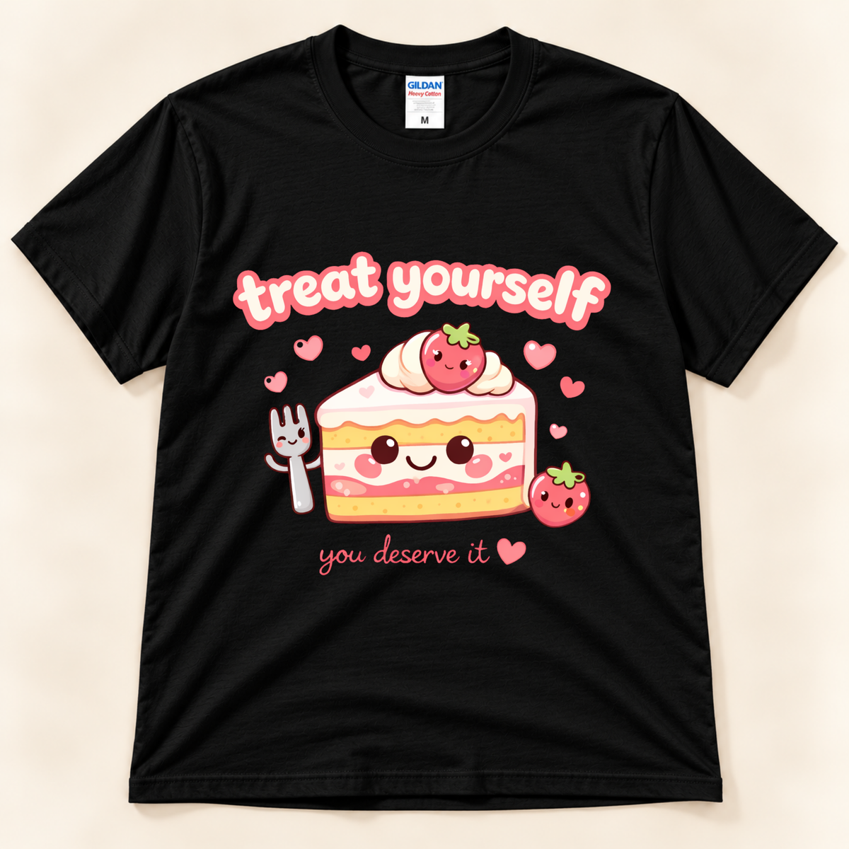 Black Gildan 5000 Treat Yourself You Deserve It graphic shirt featuring a cute smiling strawberry cake slice, happy fork, floating pink hearts and self-care message from New Chapter Tees, a California small business.