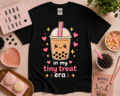 Black kawaii bubble tea shirt with in my tiny treat era design featuring pastel hearts sparkles and cute boba aesthetic styled for trendy soft life fashion and cozy café themed apparel