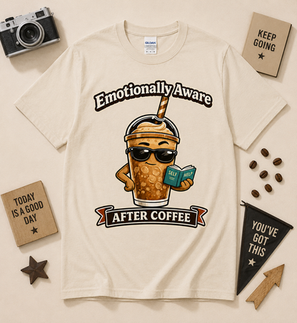 Emotionally Aware After Coffee coffee lover graphic tee on Natural Gildan shirt featuring funny iced coffee character and self improvement humor
